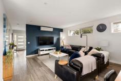  1/9 Beaconsfield Avenue Frankston VIC 3199 $750,000 - $825,000 Boasting a proud street-facing position mere moments from Frankston's vibrant array of recreational and retail delights, this meticulously presented residence opens its doors to a lifestyle where comfort meets convenience. Awash in natural light, this beautifully crafted home features carefully designed spaces and high-quality finishes, offering an enchanting living experience over two thoughtfully arranged levels. Greeted with a fluid design and practical floors, it keeps an uncomplicated layout with an open-plan living and dining zone and stone-finished kitchen outfitted with stainless appliances, timber breakfast bar, 4 x split systems (including bedrooms) and practical storage solutions. Surrounded by lush, established gardens, a sun-drenched patio offers a seamless blend of indoor and outdoor living, with glass stacker doors effortlessly retracting to forge a harmonious entertaining space. Three bedrooms and two bathrooms occupy a first-floor accommodation layout, featuring a spacious master suite with generous walk-in robe, light-filled ensuite. A powder room, open study, no body corporate fees, and a spacious double garage enhance the practicality of this home, making it appealing to professional couples, investors, and first-time buyers alike. Located just moments from Monash University and Frankston Hospital, and well-within the FHSZ, it offers effortless access to Frankston's Bayside Shopping Centre, Frankston Train Station, and the freeway for ultimate convenience. 