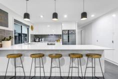  17 Bunya Way Andergrove QLD 4740 $649,000 Discover the Perfect Fusion of Style & Function at 17 Bunya Way, Andergrove. Meticulously constructed by the renowned Reef Properties, this exquisite three-bed, two-bath home sits on a fully fenced 480 m² block with double-gate side access. Whether you're a growing family, first-time buyer or savvy investor, enjoy a seamless blend of contemporary design, comfort and energy-smart living in one turnkey package. Property Highlights • Master Suite Retreat: Tranquil front-of-home sanctuary with carpeting, split-system air-conditioning and dual-sided walk-through wardrobe • Luxurious Ensuite: Frameless walk-in shower and mirrored-cavity vanity delivering a daily dose of sophistication • Gourmet Kitchen: Stone benchtops, built-in bin drawer, dishwasher, electric cooktop & oven plus generous pantry-designed for culinary enthusiasts • Open Plan Living: Bright, tiled living and dining area seamlessly flowing to the covered patio-ideal for family gatherings and entertaining • Comfortable Bedrooms: Two additional carpeted rooms, each with ceiling fan, air-conditioning and mirrored built-in robes • Stylish Family Bathroom: Separate bath, shower, vanity storage and dedicated WC for added convenience • Practical Extras: Internal laundry with quality cabinetry and direct outdoor access • Spacious Double Garage: Oversized garage with rear storage alcove and backyard entry • Energy Efficient: 6.6 kW solar system (installed two years ago) to keep power bills at bay • Outdoor Entertaining: Expansive tiled patio with ceiling fan overlooking an L-shaped lawn, garden shed and side access for boats or trailers. Nestled in a friendly Andergrove pocket, you're just minutes from schools, parks, shops and Mackay's conveniences. This home is a remarkable blend of quality, comfort and efficiency- eagerly awaiting its next chapter.  