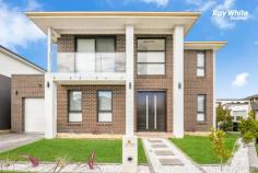  15 WALEY Street Marsden Park NSW 2765 Architecturally Designed this spacious double-storey home is an entertainer's dream. sitting on a high side of the street designed with sleek contemporary aesthetics which is ultra-modern in concept and warmly inviting. Located close to St Luke, Northbourne public and upcoming Elara Village shopping centre. * 4 bedroom, 3 bath,includding 2 masterbedroom house with builder warranty. * Spacious wide entry foyer via large doors. * Massive light filled open plan dining & living zone. * Sleek & stylish kitchen features large island bench with 60mm Caesarstone tops and waterfall edging, quality stainless steel appliances, gas cooking, dishwasher. * 4 indulgent bedrooms with walk-in robes. * 2 Masterbedroom with ensuite bathroom. * 3 ultra modern bathroom with stone-top vanity, bath and shower. * Second luxurious master bedroom downstair. * Modern family bathroom with freestanding bathtub with toilet. * Automatic single lock up garage with internal access. * multi-zone ducted air-conditioning ensure this home sets a benchmark for comfort, style and conscience. * Down-lights throughout the home. * Huge, secure back yard. CURRENTLY RENTED $850/ WEEK. * Short Drive to Business Park - Costco, Ikea, Bunnings,Riverstone ,Schofield's train station & Greenway Shopping Centre. * Easy access to Richmond Rd and M7, Bunnings, Costco, Greenway Shopping Centre * Close to playing fields & upcoming shopping centre. 