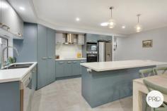  5 Golden Grove Dunbogan NSW 2443 $890,000 - $940,000 Nestled in the serene neighbourhood of Dunbogan and boasting a splendid blend of luxury and ease, 5 Golden Grove is a contemporary haven tailor-made for discerning downsizers, retirees, or astute investors. This modern three-bedroom, two-bathroom house is situated on a comfortably-sized 479.6sqm plot, ensuring a low maintenance lifestyle, mere moments from the tranquil beaches that define this idyllic locale. The residence greets you with a free-flowing floorplan accentuated by natural light filtering through elegant plantation shutters. Every detail speaks of quality, from the floor to ceiling tiles that grace the bathrooms, featuring a "his and hers" vanity in the ensuite, to the 40mm stone benchtops and modern appliances that make the kitchen both a functional and stylish space. Living areas transition seamlessly to the outdoors, where a large, covered timber deck offers a spectacular outlook to North Brother Mountain. The outdoor space, complete with a low maintenance yard, invites effortless entertainment or a peaceful retreat for a morning cuppa. A gentle 450m stroll unveils the golden sands of Dunbogan South Beach, while a 5-minute drive brings the soothing waves of Pilot Beach to your doorstep. Boating enthusiasts will appreciate the proximity to the nearest boat ramp, a mere 1.7km away, and the convenience of Laurieton CBD's amenities within a 5-minute drive. This property presents a remarkable opportunity to acquire a slice of coastal paradise, without compromising on comfort or quality. Embrace a life where beachside bliss meets modern luxury at 5 Golden Grove. 