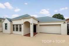  126A L'Estrange St Glenunga SA 5064 Whether you’re downsizing, investing, starting out, or raising a family, this beautifully presented Torrens Title home offers a rare opportunity to secure your place in one of Adelaide’s most desirable suburbs. Privately situated off the street, this 1999-built home is just a short walk to the highly-desired Glenunga International High School, Frewville Shopping Centre and the recently renovated Burnside Village Shopping Centre. The home offers three generous bedrooms - the master suite impresses with a walk-in robe and a luxurious renovated ensuite. The recently renovated main family bathroom is equally spacious and light-filled, complemented by a separate laundry for everyday convenience. The heart of the home is the light-filled open-plan living, dining, and kitchen area. The modern kitchen features stainless steel Miele appliances including a gas cooktop, under-bench oven, dishwasher, as well as a large corner pantry and expansive engineered stone island bench—ideal for casual meals or entertaining. Completely renovated and designed with functionality and comfort in mind, the space flows effortlessly to a private outdoor entertaining area framed by lush, colourful gardens. Big picture windows bring in an abundance of natural light and greenery. Step outside to a paved alfresco area beneath a pitched roof pergola—perfect for year-round entertaining. There’s also ample off-street parking, ideal for caravans, trailers, or extra vehicles. Additional Features: • Ducted reverse-cycle air conditioning • Security screens and plantation shutters • Solar system for energy efficiency • Generous storage options, including large garage facilities • Side-by-side garage with automatic door and rear roller door access • Zoned to Linden Park Primary and Glenunga International High School This is a home that ticks all the boxes in a location that keeps getting better. Be quick to make it yours. 