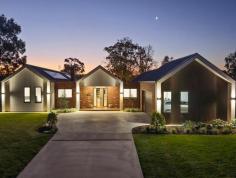 22C Maidensmith Drive Moama NSW 2731 $2,300,000 - $2,500,000 Architecturally designed and custom built, this uncompromising home captivates from the moment you arrive. The owners have curated a perfect balance of Scandinavian influence with modern farmhouse design. Flooded with natural light, the spacious floorplan seamlessly connects multiple living zones with the outdoors. Designed with families in mind, the expansive backyard encourages children to explore and play freely in their own outdoor haven. The stunning central living area unites the family while cleverly separating the master retreat from the children's wing, offering both connection and privacy. High-end finishes and a timeless design provide a sophisticated, neutral canvas, ready for the next owners to add their personal touch. This is a rare opportunity to secure a home within a tightly held cul-de-sac community, just metres from the iconic Murray River. The Facts: Design & Build - Architecturally designed by EDG Projects - Built by Tim Richards Accommodation - Master retreat with walk-through luxury closet and ensuite - Separate children's wing with four spacious bedrooms, central bathroom, and living room Living & Entertaining Gourmet kitchen with butler's pantry and built-in wine bar Expansive laundry with mud room and powder room Dedicated home office Sophisticated outdoor entertaining area featuring: Alfresco kitchen Open fireplace Lounge area Secret washroom Wood-fired pizza oven and wood storage area 11m x 4.5m swimming pool with electric heat pump Full-size tennis court (option to resurface as a multisport court) Additional Features - Established, fully irrigated gardens, with fruit orchard and raised vegetable gardens - Cubby house and Tee Pee - Double lock-up garage plus off-street parking - Dual, ducted and zoned refrigerated heating and cooling - Double-glazed windows with energy-efficient design - 10.37 kW solar panel system - Permanent access to river water + 2 x 20,000L water tanks - 12m x 6m shed What the Owners Love The current owners have cherished watching their children grow up with space to explore, entertain, and relax. Years of planning have brought their dream property to life - a forever home, now ready for a new family to create their own lasting memories. 