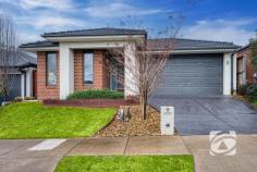  9 Basalt Dr Clyde North VIC 3978 $745,000 - $819,500 Stylish Family Living with Comfort & Convenience Offering the perfect blend of style, functionality, and low-maintenance living, this beautifully presented four-bedroom home is ideal for families, or savvy investors. At the heart of the home is a modern kitchen featuring sleek stone benchtops, stainless steel appliances, and generous storage perfectly positioned to overlook the light-filled open-plan living and meals area. Sliding doors extend the living space to a private patio, ideal for entertaining or relaxing, year-round. A separate cozy lounge provides the perfect retreat or additional space for growing families. The master bedroom boasts a private ensuite, while the remaining bedrooms are serviced by a well-appointed family bathroom. Set on a low-maintenance allotment with a vibrant, colourful garden, this home also features a double car garage with rear access, ideal for trailer storage. Perfectly positioned close to local schools, parkland, and shopping facilities, this is an exceptional opportunity to secure a quality home in a highly private enclave. 