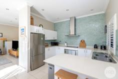  157 Bagnall Beach Road Corlette NSW 2315 Positioned in the highly sought-after suburb of Corlette, and approx. a 150m stroll from the beautiful water's edge of Bagnall Beach, this stylish and low-maintenance home offers the perfect blend of comfort, convenience, and coastal charm. Spread across two levels, the immaculate home features three bedrooms of accommodation, two bathrooms, and secure parking for two vehicles. On the entry level, you'll find two well-sized bedrooms, both with built-in wardrobes and split system air conditioning for year-round comfort. The main bathroom on this level is beautifully finished with floor-to-ceiling tiles in a modern white and grey palette, featuring a sleek vanity, shower, bath, and toilet. There's also a spacious laundry, which opens out to a private courtyard with low-maintenance landscaping. On the upper-level, natural light floods the generous living area through large windows and sliding doors that lead to a wrap-around balcony, perfect for entertaining or enjoying the sea breeze. The stunning kitchen is well-equipped with an electric cooktop, oven, dishwasher, white cabinetry, and stone benchtops, all complemented by a stylish blue feature tile splashback. The master bedroom is generously sized with built-in wardrobes, plush new grey carpet, and a private ensuite. It also enjoys direct access to the balcony through sliding doors, creating a seamless indoor-outdoor flow and the perfect spot to enjoy your morning coffee. This level also includes access to a second tiled courtyard, adding to the home's appeal and functionality for entertaining. With Dutchman's Beach, Anchorage Port Stephens, local cafes, schools, and shopping all nearby, this home presents an ideal opportunity for those seeking a relaxed beachside lifestyle or a fantastic investment in the heart of Port Stephens. 