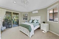  22 Fairmeadow Dr Mount Pleasant QLD 4740 $699,000 Welcome to a home where space, comfort and lifestyle come together in perfect harmony. Tucked into one of Mount Pleasant's most convenient pockets, 22 Fairmeadow Drive is more than just another property, it's a home that's been filled with love and memories for the past 16 years and now it's ready to welcome a new family. Behind its solid brick facade lies a surprisingly expansive residence, with approximately 305m² under roof and a generous 746m² block. As you step through the front door, you're greeted by soaring raked ceilings, cooling tiles underfoot and skylights that fill the space with natural light. The feeling is immediate: this is a home made for easy, everyday living and relaxed entertaining. At its heart is a stunning kitchen that brings everyone together. Featuring rich timber cabinetry, expansive prep areas, a breakfast bar, 6 burner gas cooktop, built-in oven & microwave finished off with a practical servery bar. It flows effortlessly into the main open plan living and dining area, which spills out through wide glass sliders to a covered patio, perfect for weekend barbecues or evening drinks under the stars. There are two generous living zones to enjoy… One at the front of the home offering a quiet retreat and another that anchors the kitchen and entertaining spaces. Need more room? The original garage has been stylishly converted into a versatile space with epoxy flooring and glass doors, making it ideal for a home office, studio or kids playroom. Thoughtfully designed for family living, the home offers four spacious bedrooms, each with built-in robes and split system air conditioning. The master suite is tucked away for privacy, with soft carpeting, a walk-in robe, beautifully tiled ensuite with his & hers vanities and its own access to the outdoor area. The remaining bedrooms are all generously sized with durable linoleum flooring and share a large, light-filled bathroom with a bathtub and floor to ceiling tiles. There's also an internal laundry with direct yard access, multiple linen cupboards for effortless storage and a neat, low maintenance backyard. Energy efficiency is covered too, thanks to an approximately 5kW solar system. The home is fully fenced, family friendly and move-in ready! all set in a location that puts schools, shops, parks and everything you need just moments from your door. If you're looking for a place where you can truly settle in and feel at home, 22 Fairmeadow Drive delivers in every way. Warm, welcoming and wonderfully spacious… 