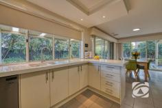  7 Balaton Dr Pakenham VIC 3810 $660,000 - $720,000 Immaculate Living in a Peaceful Pocket Tucked away in a quiet, family-friendly neighbourhood, this beautifully presented three-bedroom home with a separate study offers a perfect balance of space, style, and practicality. Designed for modern living, it features two generous living zones, a sleek kitchen with walk-in pantry and electric appliances, and a light-filled open-plan layout ideal for families and entertaining. All bedrooms are spacious with built-in robes, while the master enjoys a walk-in robe and private ensuite. The versatile study is perfect for working from home or use as a nursery. Outdoors, a large wrap-around pergola overlooks a lush, low-maintenance garden, providing the ideal space to relax or entertain. Additional highlights include a 6.6kW solar system, electric ducted heating and cooling, full-size laundry, and a double garage with rear roller access and space for extra vehicles. Immaculately maintained and move-in ready, this home delivers comfort, convenience, and quality in a peaceful, well-connected location. 