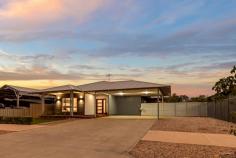  13 Garfu Link Bilingurr WA 6725 $899,000 Perfectly positioned in a sought-after Broome North address, this immaculately presented 2022-built home offers the ultimate in modern family living. Combining coastal elegance with everyday functionality, this stunning four-bedroom residence delivers style, space, and a seamless connection between indoor and outdoor living. From the moment you arrive, you'll be captivated by the home's standout street appeal. A charming weatherboard feature wall, elegant wall-mounted lighting, and meticulously manicured gardens set the tone for what lies beyond. A striking polished timber and opaque glass entry door opens to a wide, welcoming hallway that flows into a light-filled open-plan living and dining space. Oversized windows frame tranquil views of the rear gardens, enhancing the airy, relaxed ambiance. The home's interior is defined by a refined coastal-inspired colour palette, featuring crisp white walls and high-quality vinyl plank flooring that runs throughout the main living areas. At the heart of the home is the designer kitchen - a dream space for entertainers and busy families alike. With stylish pendant lighting, a statement tile splashback, and a generous island bench with a breakfast bar, the kitchen is both beautiful and practical. Tucked away behind it, a fully equipped butler's pantry adds extra storage and prep space, ensuring a clutter-free lifestyle. The spacious master suite is a peaceful retreat, boasting a large walk-in wardrobe and a luxurious ensuite bathroom complete with a sleek double vanity and high-end fittings. Three additional bedrooms offer comfort and convenience, each featuring mirrored built-in robes and split-system air conditioning. The tiled family bathroom is thoughtfully designed, showcasing quality fixtures and finishes that echo the home's modern aesthetic. Step outside to a truly exceptional outdoor entertaining area, where an undercover alfresco space merges effortlessly with an extended patio - the perfect setting for gatherings year-round. A fully shaded swimming pool including pool heater, with paved surrounds invites endless enjoyment, while the lush rear lawn and established tropical garden beds offer a private oasis for children and pets to explore. Practical features abound, including secure gated side access - ideal for storing a boat, caravan, or trailer - a lockable storeroom, and a large garden shed for all your outdoor essentials. Conveniently located just moments from Broome North Primary School, local parks, and with quick access to the Cable Beach tourist precinct via the soon-to-be completed Tanami Drive extension, this exceptional home combines lifestyle and location like few others. Don't miss your opportunity to secure this beautifully crafted family haven in one of Broome's most desirable neighbourhoods. 