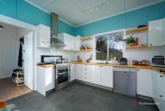  194 Mann Street Armidale NSW 2350 $450,000 - $480,000 Positioned in a sought-after South Armidale location, just moments from popular corner stores and public transport, this charming weatherboard home offers both investment appeal and first home buyer potential. Inside, you’ll find three comfortable bedrooms, two of which include built-in wardrobes. The updated kitchen features crisp white cabinetry, stone-look flooring, and a dishwasher, flowing into a dining area warmed by a cosy wood heater. A carpeted living room provides a welcoming space to relax and opens onto a covered patio—perfect for entertaining year-round. The home is well-equipped with two bathrooms, a sunroom at the front for added living space or a quiet retreat, and ample parking with a single lock-up garage plus a single carport. Currently tenanted, this is a ready-made investment or a great foundation to move into and make your own. 