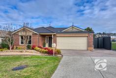  7 Balaton Dr Pakenham VIC 3810 $660,000 - $720,000 Immaculate Living in a Peaceful Pocket Tucked away in a quiet, family-friendly neighbourhood, this beautifully presented three-bedroom home with a separate study offers a perfect balance of space, style, and practicality. Designed for modern living, it features two generous living zones, a sleek kitchen with walk-in pantry and electric appliances, and a light-filled open-plan layout ideal for families and entertaining. All bedrooms are spacious with built-in robes, while the master enjoys a walk-in robe and private ensuite. The versatile study is perfect for working from home or use as a nursery. Outdoors, a large wrap-around pergola overlooks a lush, low-maintenance garden, providing the ideal space to relax or entertain. Additional highlights include a 6.6kW solar system, electric ducted heating and cooling, full-size laundry, and a double garage with rear roller access and space for extra vehicles. Immaculately maintained and move-in ready, this home delivers comfort, convenience, and quality in a peaceful, well-connected location. 