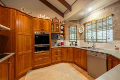  47 Knoetzechs Rd North Casino NSW 2470 $868,000 Welcome to "Nalbot Cottage," a truly captivating custom-built brick home that exudes charm, warmth, and character. Nestled in the serene heart of North Casino, this unique residence offers the perfect balance between modern comfort and natural beauty. With a thoughtful design that showcases its individuality, this home invites you to embrace a tranquil yet sophisticated lifestyle, with its wrap-around veranda and newly installed roof setting the stage for relaxed living. Stepping inside, you'll be greeted by a comfortable open-plan living area with soaring raked ceilings and eye-catching stained-glass feature windows. The living space is equipped for all seasons, featuring air-conditioning and a cozy wood heater, ensuring comfort year-round. The timber kitchen is well-appointed with a dishwasher, pantry, and ample bench and cupboard space, making it a perfect spot for home chefs to create delicious meals. The home boasts three generously sized bedrooms, each with built-in wardrobes and ceiling fans, all opening onto the expansive veranda, where you can enjoy your morning coffee while soaking in the peaceful surroundings. The stylish bathroom offers both a shower and bath, with the convenience of a separate toilet. The outdoor space is equally as impressive, with a leafy backyard leading down to a second level, where you'll find a peaceful sitting area and plenty of space for the family to relax, play, and explore. For those seeking a sustainable lifestyle, the property includes a large chicken coop, citrus trees, a variety of other fruit-bearing plants, and a greenhouse with raised garden beds. The grounds are beautifully landscaped, with a stunning sandstone retaining wall in the front yard and a fully fenced backyard that is divided into two sections, providing both privacy and space to enjoy. Eco-friendly features such as twin solar systems and ample water storage, including a 50,000-litre rainwater tank and an additional 4,000-litre tank, ensure a sustainable lifestyle, with outdoor watering conveniently sourced from the nearby lagoon. A 10,000-litre plunged pool adds a touch of luxury to this nature-filled retreat, while a double carport and two garden sheds provide plenty of storage and parking space. Conveniently located just 30 minutes from Lismore, 7 minutes from Casino, and 20 minutes from Kyogle, with easy access to a local Christian school, mail delivery, and garbage service. Nalbot Cottage is a sanctuary of comfort and serenity. This unique home is a rare opportunity to enjoy a peaceful lifestyle in a beautiful, eco-friendly setting. 