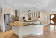  6-8 Burn Close Gordonvale QLD 4865 $1,200,000 Therese Plath delivers the ultimate family lifestyle property! Every finish has been selected to create a home as functional as it is stunning. Set on a sprawling 2,045m² block in one of the area's most tightly held and sought-after streets, this exceptional property has just hit the market and is ready to welcome its new owners -and it's one not to miss! Boasting commanding street presence, this meticulously maintained and thoughtfully crafted family home offers the ideal blend of space, modern style, and practical functionality. From the moment you enter, you'll be captivated by the sunken media room and flowing spacious open-plan layout, where the sleek 2 Pak kitchen anchors the light-filled living and dining zones, opening seamlessly to the outdoors. Bathed in natural light and at the heart of the home lies a stunning gourmet kitchen-truly a chef's dream. Thoughtfully designed for both everyday functionality and grand-scale entertaining, this impressive space features high-end appliances, sleek stone countertops, and beautiful custom cabinetry. With an abundance of overhead cupboards, deep drawers, and a generous pantry, there's no shortage of storage. Whether you're preparing weeknight meals or hosting family and friends, this kitchen offers the perfect blend of style, space, and practicality. Outdoors is where this home truly shines-your very own tropical resort. Host unforgettable gatherings under the massive alfresco patio, all while enjoying views of the stunning in-ground pool, manicured lawns, and a second gazebo complete with pizza oven and park-like, tropical garden surrounds. For tradies, tinkerers, or anyone in need of serious storage and workspace, the massive 3-bay powered shed is an absolute standout. Built with functionality in mind, it features high-clearance roller doors for easy vehicle or equipment access, as well as a mezzanine level that adds valuable extra storage without sacrificing floor space. Whether you need room for tools, machinery, or weekend projects, this shed has you covered. It also includes a versatile enclosed area-perfect for use as a home office, gym, hobby studio, or even a teenager's retreat. With wide side access from the street, getting in and out is a breeze, making this a rare and valuable addition to an already incredible property. Standout Features of this extraordinary property include: 4 spacious bedrooms including private master retreat with resort style en-suite + WIR Separate office or could be 5th Bedroom Gourmet granite kitchen with large island bench and pantry Spa bathroom + separate powder room with double vanities Split system air conditioning throughout Generous Internal laundry with ample storage and folding space Tiled triple lock up remote car accommodation with drive-through access to rear Security screens, camera system & fully insulated walls Lush established tropical gardens & fruit trees Peaceful, family-friendly cul-de-sac position This is the ultimate package for families or entertainers who value space, quality and lifestyle. With room for everyone-and everything-this unique home is ready for its next chapter. 