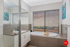  68 Warren Street Kyneton VIC 3444 • Four bedrooms plus office & three flexible living zones • Master retreat with ensuite & WIR; private kids' bedroom wing • Stylish kitchen with island, WIP & stainless appliances • Outdoor entertaining deck, tiered backyard & double garage 
