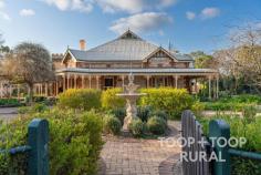  35 Cockburn Rd Jamestown SA 5491 $875,000 Positioned in the heart of Jamestown in South Australia’s Mid North, Cockburn House is a striking Federation-era residence built in 1912. Rich in history and architectural elegance, it has passed through the hands of notable custodians—from the Davies family to esteemed surgeon Dr. Shepherd, and most recently, the Luckraft family. Immaculately presented across 3,138sqm, the property showcases stone construction, ornate detailing, and sweeping proportions reminiscent of North Adelaide’s most distinguished homes — yet offers the peaceful charm of rural living. With eight main rooms, the home comfortably accommodates up to eight guests, featuring four generous bedrooms and two bathrooms (including an ensuite with bidet). The large kitchen, fitted with Tasmanian oak cabinetry and cellar access, is ideal for hosting guests or events. Formal living and dining rooms, a grand piano, fireplaces, and wide hallways add character and warmth throughout. Outdoors, the English-style gardens, bullnose verandahs, rotunda, and grass tennis court provide an exquisite backdrop for boutique accommodation or intimate events. A 6kW solar system, NBN, ducted air conditioning, and ample paved off-street parking complete the offering. An ideal blend of heritage, lifestyle or Accomodation business opportunity — Cockburn House is ready to continue its legacy. 