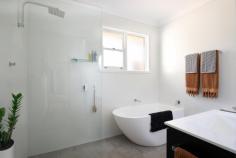 54 Inconstant Street Blackheath NSW 2785 $1,370,000 - $1,420,000 Step into timeless style with this beautifully preserved circa 1974 double brick home, where retro design meets contemporary comfort. Nestled on a flat, landscaped block in a premium location near the breathtaking Rhododendron Gardens, this four-bedroom residence is a rare gem that blends vintage character with thoughtful modern updates. Features You'll Love: Character-Rich Design - Crisp, clean interiors highlight classic 70's elements - timber windows, elegant archways, and a layout that flows effortlessly through three sun-drenched living spaces, each capturing natural light throughout the day - all anchored by a roaring slow combustion heater that adds warmth and charm. Gourmet Kitchen Masterpiece - Cook in style in your chef's kitchen featuring thick stone benchtops, premium appliances, a charming bay window, walk-in pantry, and a discreetly tucked-away hidden laundry and dirty kitchen - a clever solution for clean, clutter-free living. Vintage Meets Luxe Bathrooms - Enjoy the original retro bathroom in pristine condition, or unwind in the brand-new bathroom oasis complete with a soothing moon bath - the ultimate blend of nostalgia and indulgence. Spacious and Stylish Living- With four bedrooms, new flooring, and versatile living areas designed to suit family life or entertaining, this home offers plenty of room to grow, relax, and make memories. Outdoor Appeal - Situated on a level block with established gardens, an undercover entertaining area, single garage, and garden shed, the home delivers both lifestyle and practicality in equal measure. Unbeatable Location - In one of Blackheaths best streets, moments from the iconic Rhododendron Gardens, enjoy the serenity of nature with all the convenience of local amenities nearby. A perfect setting for families, gardeners, and lovers of classic architecture. This is more than a home - it's a slice of architectural history, lovingly maintained and ready for its next chapter. Homes with this level of character and quality don't come along often. Inspect today and fall in love with 70's style, reimagined. 