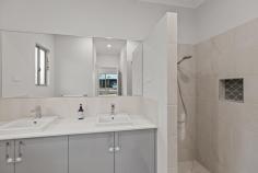  13 Garfu Link Bilingurr WA 6725 $899,000 Perfectly positioned in a sought-after Broome North address, this immaculately presented 2022-built home offers the ultimate in modern family living. Combining coastal elegance with everyday functionality, this stunning four-bedroom residence delivers style, space, and a seamless connection between indoor and outdoor living. From the moment you arrive, you'll be captivated by the home's standout street appeal. A charming weatherboard feature wall, elegant wall-mounted lighting, and meticulously manicured gardens set the tone for what lies beyond. A striking polished timber and opaque glass entry door opens to a wide, welcoming hallway that flows into a light-filled open-plan living and dining space. Oversized windows frame tranquil views of the rear gardens, enhancing the airy, relaxed ambiance. The home's interior is defined by a refined coastal-inspired colour palette, featuring crisp white walls and high-quality vinyl plank flooring that runs throughout the main living areas. At the heart of the home is the designer kitchen - a dream space for entertainers and busy families alike. With stylish pendant lighting, a statement tile splashback, and a generous island bench with a breakfast bar, the kitchen is both beautiful and practical. Tucked away behind it, a fully equipped butler's pantry adds extra storage and prep space, ensuring a clutter-free lifestyle. The spacious master suite is a peaceful retreat, boasting a large walk-in wardrobe and a luxurious ensuite bathroom complete with a sleek double vanity and high-end fittings. Three additional bedrooms offer comfort and convenience, each featuring mirrored built-in robes and split-system air conditioning. The tiled family bathroom is thoughtfully designed, showcasing quality fixtures and finishes that echo the home's modern aesthetic. Step outside to a truly exceptional outdoor entertaining area, where an undercover alfresco space merges effortlessly with an extended patio - the perfect setting for gatherings year-round. A fully shaded swimming pool including pool heater, with paved surrounds invites endless enjoyment, while the lush rear lawn and established tropical garden beds offer a private oasis for children and pets to explore. Practical features abound, including secure gated side access - ideal for storing a boat, caravan, or trailer - a lockable storeroom, and a large garden shed for all your outdoor essentials. Conveniently located just moments from Broome North Primary School, local parks, and with quick access to the Cable Beach tourist precinct via the soon-to-be completed Tanami Drive extension, this exceptional home combines lifestyle and location like few others. Don't miss your opportunity to secure this beautifully crafted family haven in one of Broome's most desirable neighbourhoods. 