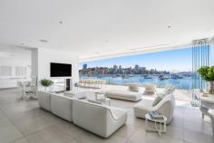  3A Buckhurst Ave Point Piper NSW 2027 World-class Seven Shillings beachfront entertainer A unique privilege reserved for a fortunate few, this remarkable residence lays claim to a breathtaking waterfront location with a 20m frontage to Seven Shillings Beach. Delivering luxurious harbour living at its contemporary best, its ingenious design allows the uninterrupted panorama of Sydney Harbour to be the star performer, with the Harbour Bridge and city skyline taking centre stage from almost every vantage point. Designed by Jamisa Architects and constructed to meticulous standards, the residence exudes a minimalist aesthetic, characterised by clean, open spaces and sleek finishes, with walls of glass stacker doors folding away to create a seamless interaction between the indoors and out. Graced with all the modern luxuries you would expect of a property of this calibre, from lift access to state-of-the-art security, this is a trophy home that comes along rarely. Take a stroll down the beach to Redleaf Pool and Café or take a leisurely walk into Double Bay and enjoy its cosmopolitan dining scene and exclusive boutiques. Key Features Indoor Four ensuite bedrooms, main with WIR and bath Vast family room with integrated bar and study Free-flowing living/dining, rumpus/media room Gaggenau induction kitchen with butler's pantry Outdoor Enormous wraparound entertaining terrace All bedrooms open to upper-level terraces DLUG with internal access, guest car space Direct access to glorious Seven Shillings Beach Additional Lift to both levels, integrated sound, guest WC Air con, heated floors, double-sided fireplace Integrated speakers and CCTV on both levels Excellent security, abundant storage, cellar Inspection Saturday: 1:45-2:15PM For Sale Details: Expressions of interest 