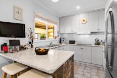  1/1 Massey Close Mildura VIC 3500 $390,000 - $420,000 Welcome to a beautifully presented brick veneer unit that offers the ideal combination of comfort, space, and privacy-perfectly suited to first home buyers, investors, or those looking to downsize without compromise. Positioned in a tightly held complex of only two, this property occupies a generous 490 sqm allotment and delivers outstanding value with its blend of indoor and outdoor features. Inside, the home features three well-appointed bedrooms. The master bedroom includes a walk-in robe, ceiling fan, and TV point, while the second bedroom offers a large built-in robe and ceiling fan. The third bedroom is complete with a built-in robe and built-in desk. The open-plan living and dining area is enhanced by near-new flooring, ceiling fans, and a built-in bar-creating an inviting space to relax or entertain. The kitchen is fitted with electric cooking, wall oven, microwave nook, and plenty of workspace, making meal preparation both practical and enjoyable. Comfort is assured year-round with ducted gas heating, a gas fireplace for cozy winter nights, and evaporative cooling to keep you comfortable through summer. Outside, you'll find a good-sized yard and a covered outdoor entertaining area that's perfect for gatherings or quiet afternoons. Additional features include a single garage with automatic roller door, garden shed, and established surroundings that offer both privacy and ease of maintenance. This unique unit delivers a rare combination of space, features, and position. Don't miss the opportunity to secure this low-maintenance lifestyle property. 