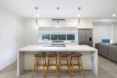  357 Marion Street Georges Hall NSW 2198 $1,599,950 Offering an impressive blend of size, comfort and quality finishes, this near-new duplex is a rare find set on over 400m2 with a flexible layout ideal for modern family living. Boasting five generous bedrooms, all with built-in wardrobes, plus a separate home office, this residence provides space for everyone. The master suite features a walk-in wardrobe, ensuite, ceiling fan and a private balcony with sweeping district views toward the Sutherland Shire. Living zones are thoughtfully spread across both levels. The open-plan kitchen, living and dining area flows effortlessly to the outdoor alfresco, while the upstairs living space is perfect as a kids' retreat or additional lounge. The kitchen impresses with 40mm stone benchtops, gas cooking and quality appliances. There are modern bathrooms on both levels, plus a separate laundry with an extra toilet and direct access to the yard. Outdoors, entertain in style under the covered alfresco with a built-in gas BBQ, burner and sink, overlooking the spacious backyard. Additional features include: Ducted air conditioning and ducted vacuum Security alarm and video intercom Combination of double brick and brick veneer construction Single lock-up garage plus separate driveway with off-street parking A premium opportunity offering space, flexibility and a rare land size - all in a quiet, family-friendly setting. 