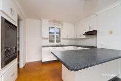  20 Oak Tree Drive Armidale NSW 2350 $400,000 - $440,000 Positioned on a peaceful corner block in a quiet street, 20 Oak Tree Drive presents an exciting opportunity for first-home buyers seeking space, comfort, and future potential. Just minutes from the heart of town, this well-located property combines convenience with a warm, homely feel. Inside, you’ll find two generously sized bedrooms, both featuring built-in wardrobes. The open-plan living and dining area is enhanced by stylish dark floor tiles and a cosy wood fireplace—perfect for relaxing or entertaining year-round. The U-shaped kitchen is designed with functionality in mind, offering ample storage and a walk-in pantry for added convenience. Two bathrooms add to the practicality of the home, while plantation shutters throughout offer a tasteful finishing touch and allow for both privacy and natural light. Set on a generous 787m² block, the property also includes a single carport, shed, and an inviting undercover front porch—ideal for enjoying a morning coffee or evening breeze. Whether you’re looking to move straight in or personalise and add value over time, this is a fantastic entry-level opportunity in a sought-after location. 