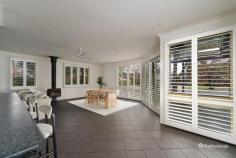  20 Oak Tree Drive Armidale NSW 2350 $400,000 - $440,000 Positioned on a peaceful corner block in a quiet street, 20 Oak Tree Drive presents an exciting opportunity for first-home buyers seeking space, comfort, and future potential. Just minutes from the heart of town, this well-located property combines convenience with a warm, homely feel. Inside, you’ll find two generously sized bedrooms, both featuring built-in wardrobes. The open-plan living and dining area is enhanced by stylish dark floor tiles and a cosy wood fireplace—perfect for relaxing or entertaining year-round. The U-shaped kitchen is designed with functionality in mind, offering ample storage and a walk-in pantry for added convenience. Two bathrooms add to the practicality of the home, while plantation shutters throughout offer a tasteful finishing touch and allow for both privacy and natural light. Set on a generous 787m² block, the property also includes a single carport, shed, and an inviting undercover front porch—ideal for enjoying a morning coffee or evening breeze. Whether you’re looking to move straight in or personalise and add value over time, this is a fantastic entry-level opportunity in a sought-after location. 