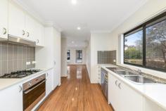  2/2 Belconnen Way Page ACT 2614 Ideally situated for unmatched convenience, this stylishly renovated 3-bedroom, 2-bathroom residence presents a remarkable opportunity to enjoy a vibrant, low-maintenance lifestyle in one of Belconnen's most sought-after pockets. Perfectly tailored for modern living, this home places you just moments from an abundance of amenities, making everyday life a breeze. From retail therapy at the Belconnen Shopping District to the local charm of Jamison Shops, you'll find everything you need just minutes away. Families will appreciate proximity to top-rated schools including Weetangera and Hawker Primary, while seamless access to public transport ensures quick and direct commutes to Canberra's city centre and southern suburbs. Step inside to discover a home that has been thoughtfully updated throughout, offering a fresh and contemporary aesthetic. The open-plan layout is both practical and spacious, delivering an ideal blend of comfort and style. The well-appointed kitchen features modern fittings and finishes, while the bathrooms provide a touch of elegance with their sleek design and quality fixtures. Designed with low-maintenance living in mind, this property eliminates the burden of garden upkeep-giving you more time to focus on what matters most. The lock-up-and-leave lifestyle offered here provides both security and peace of mind. This property caters to a wide range of buyers-whether you're entering the market, upsizing to this convenient and sought after postcode, downsizing from a larger home, or seeking a hassle-free investment in a high-demand location. With nothing to do but move in and enjoy, this is your chance to secure a modern, turnkey home in a location that truly delivers on lifestyle and connectivity. Don't miss this exceptional opportunity-homes of this calibre and convenience rarely stay on the market for long! Features • Walk in Robe and Ensuite in Main Bedroom • 2 Bedrooms with built-in-robes • Large upstairs bathroom • Spacious kitchen with ample storage & bench space • Ground floor Powder Room • Gas Cooktop • Electric Oven • Single attached garage with internal access • Automatic garage door • Private courtyard • Low maintenance gardens • Additional room to park as well as complex visitor parking • Ample storage throughout the property • New flooring, carpets and paint throughout Location • Westfield Belconnen (1.7km) - 4 minute drive • Jamison Center (2.1km) - 5 minute drive • Page Shops (1.0km) - 3 minute drive • Lake Ginninderra (2.1km) - 5 Minute drive • Calvary Private Hospital (3.5km) - 7 minute drive • Close vicinity to Hawker and Weetangera Primary School 