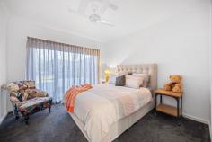  5 Banksia Court Moama NSW 2731 $1,700,000 - $1,850,000 Tucked away in a prestigious pocket in Murray Banks Estate Moama and only a stones throw away from the Murray River is this impeccably built home that offers the perfect blend of luxury, functionality, and lifestyle. From the moment you arrive, you'll be impressed by the craftsmanship and attention to detail that sets this property apart from others. From the moment you enter the front door you will be able to appreciate the grand entrance, high ceilings and the warm polished concrete floors. Off to one side of the home you will find the first three bedrooms all with walk in robes, ceiling fans and soft flowing sheers. The separate study allows for a quiet, focused environment away from the living rooms. The stunning main bathroom is fitted with an inviting bath, stylish tapware and plantation shutters for added privacy. There is a separate powder room that services this side of the home and guests. This section of the home also has a generously sized separate lounge that leads to the outdoor area and a view of the immaculately maintained rear yard. Off to the other side of the home is the beautifully presented open plan kitchen, main living and dining area that overlooks the outdoor area and sparkling inground pool. The lounge room has a cozy gas log fire perfect to sit around in the cooler months. The spectacular kitchen is perfect for entertaining and cooking. From the long stone island bench to the double wall ovens, all of the high end appliances will make you want to spend a lot more time in the kitchen. A stand out feature of the home is the huge walk in pantry that is fitted with a dishwasher, separate sink and extensive storage. The master suite is just off the main living area and has direct access outside through sliding doors. The bedroom has a beautiful ensuite with double shower, his and hers vanities and a separate toilet. This flows through to the spacious walk-in wardrobe. For added convenience the double car garage has double access to the home entering either to the entrance hallway or directly into the large mudroom and laundry. The mudroom and laundry have plenty of storage and is a large space that can be closed off from the main living area. The home is kept comfortable through all seasons with 2 ducted evaporative cooling systems, floor heating and the additional gas log fire in the living area. This list goes on, outside an outdoor entertaining area with exposed aggregate concrete, black industrial ceiling fans and an outdoor kitchen perfect for gatherings or quiet nights with family and friends. The inviting solar heated inground pool is perfect for warmer months surrounded by greenery for added privacy. The large yard allows for secure side access leading up to the large shed with a concrete base and a Coonara perfect for all your tools and your pride and joys. There is also potential for side access on the Southern side of the property if needed. Additionally there is a garden shed for added storage. This is a rare opportunity to secure a thoughtfully designed, high-quality home that blends relaxed living with exceptional functionality - just moments from the river. 