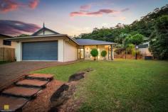  5 Senate Street Bentley Park QLD 4869 $889,000 Whether you're seeking space, serenity, or the perfect family lifestyle, this unique offering delivers it all. Set high in sought-after Upper Bentley Park, this beautifully elevated family home is a dream lifestyle opportunity you won't want to miss. Commanding panoramic mountain views and bathed in cooling summer breezes, this spacious home delivers a five-star lifestyle of refined comfort and seamless entertaining and everyday comfort. From the moment you arrive, the impeccable street presence, established tropical gardens, and resort-inspired sparkling saltwater pool set the tone for what lies beyond on the expansive 937m² allotment. Step inside to discover a light-filled, expansive open-plan design where multiple living zones flow seamlessly to a central alfresco space - perfect for relaxed family meals or entertaining guest's poolside. The recently renovated, large gourmet kitchen is the heart of the home and a chef's dream, boasting stainless steel appliances, Italian tiles and an abundant of storage, and a statement island bench ensuring comfort and practicality. The adjoining air-conditioned dining opens fully to the covered, private patio, crafting an idyllic indoor-outdoor experience that captures the essence of tropical Far North Queensland living. The massive second living area offers a serene retreat with stunning poolside views, perfect for relaxed lounging or effortless family entertaining. All four bedrooms are air-conditioned, generously sized, and thoughtfully positioned. The main suite enjoys private access to the alfresco, a walk-in robe, and a well-appointed en-suite - your own peaceful retreat. Both the renovated en-suite and main bathroom showcase modern finishes and thoughtful design, offering a luxurious touch to everyday living. Features You'll Love: Elevated 937m² block with commanding views and privacy Resort-style saltwater pool surrounded by lush greenery Massive open-plan living spaces with separate lounge and entertainer's kitchen 13.2kW solar system Security cameras linked to phone & TV Extra-large double remote garage with internal access All new fans throughout and air conditioners Security screens Garden shed Fully painted in 2023 New top end vinyl flooring to living areas Perched high on the hill and commanding breathtaking, uninterrupted views that will never be built out, this exceptional residence will be the envy of all. This residence is more than just a home, it is a private sanctuary offering space, style, and serenity in equal measure. Ideally located close to schools, day care centres, shops, and sporting facilities - and just 20 minutes from the heart of Cairns - this is the ultimate lifestyle address. 
