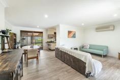  55 Donaldson St Coraki NSW 2471 $565,000 Positioned on a generous, near-level 703m² block in a sought-after flood-free location, this brick and tile residence represents a prime opportunity for first-time buyers entering the market, or for investors seeking solid returns and long-term growth. From the moment you arrive, this property offers impressive versatility. With side access for a caravan or boat, and a spacious three-bay Colorbond shed—complete with room for two vehicles plus a dedicated workshop—it’s clear that lifestyle and functionality were top of mind in its design. Inside, the home delivers space and comfort in equal measure. Boasting four generous bedrooms—three of which feature built-ins—it provides ample room for growing families or shared living. The open plan living and dining area, equipped with air conditioning, ensures year-round comfort, while the galley-style kitchen offers a gas upright stove, pantry, and seamless flow for everyday use. Families will appreciate the thoughtful layout, including a practical three-way bathroom plus a second shower and toilet—ideal for busy households. At the rear, a full-length entertaining area beckons, perfect for weekend barbecues or relaxed family gatherings. Further enhancing the property’s appeal are energy-saving solar panels, reducing household costs and environmental impact. Currently leased at $585 per week to a reliable family, it also offers immediate rental income for investors looking to hit the ground running. Whether you're stepping into the property market or expanding your portfolio, this well-appointed, low-maintenance home blends comfort, space, and value—a winning combination in today’s competitive market. 
