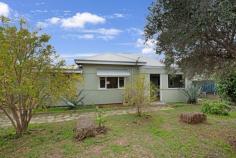  9 Queen Street Geraldton WA 6530 $579,000 Step back in time with this delightful 3-bedroom, 1-bathroom fibro home, steeped in character and charm. Built in 1935, this lovingly preserved family residence showcases the elegance of a bygone era, offering timeless features rarely found today. Inside, you'll find three bedrooms and a warm, inviting living area that reflects the home's original personality. Majority of this home has had new ceiling and internal walls replaced, The kitchen has received a renovation about three years ago this includes reverse osmosis water system and recently serviced. Completely original brick feature surround the Gas cooktop (5 Burner) and electric oven, perfect for those who appreciate authentic craftsmanship. The renovated bathroom has colour and appeal with an open shower with vanity area. There is an addition shower by the laundry with separate toilet. Other Features: 3 split system air-conditioners Ceiling Fan Throughout Fireplace in Living Area Wooden Boards Insulation to walls and ceilings Timber Skirtings and Wooden Window Frames Stainless steel mesh to bedroom and lounge windows Security Screen to front door Ornate Ceiling to bedroom one, two and dining area Back sleepout/sunroom or ideal if you work from home/office Laundry toward the back of the home 9000 Rainwater Tank off back patio (drinking water) Double Shed with Steel Bench and 3 Phase Power 3KW Solar Panels 1 x 9,000 litre water tank for vegetable garden Lawn to rear yard Corner Lot Array of Shrubs to side of property and to the Shire verge Large area allocated for Vegetable Garden and Chicken yard This home is ideal for buyers looking to restore or reimagine a property with solid bones and historical character. With its classic charm and endless potential, this rare gem won't last long. 