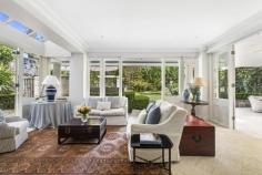  8 Rosemont Ave Woollahra NSW 2025 Grand character residence with garden sanctuary and pool Secluded in an exclusive tree-lined enclave in Woollahra's prestigious consular belt, this stately family residence is one of Woollahra's finest homes. Nestled on a large sunny level block, it's framed by Paul Bangay designed gardens and alfresco entertaining areas complete with a pool, giving it a sense of sanctuary. Spanning two vast levels, the residence is graced with an abundance of both accommodation and entertaining space, housing large families in absolute privacy. Beautifully appointed with a fusion of classic and contemporary detailing, it's blessed with a host of prestige details such as a lift, sauna and abundant off-street parking, making it both timelessly elegant and incredibly comfortable. Enjoy the charming eateries, antique stores and boutiques of Queen Street village just moments from your door, with Centennial Park, the retail hub of Bondi Junction and cosmopolitan Double Bay all within minutes of this world-class home. Key Features Indoor Luxury main suite with ensuite, WIR and office Stately lounge and sitting room, adjoining library Expansive casual living/dining, formal dining room Large media room Well-appointed stone-topped kitchen Outdoor Sun-soaked Romanesque-style swimming pool Expansive covered entertaining terrace and loggia Level lawn and lush garden setting Double garage with internal access 3 additional parking spaces Additional Expansive marble entry hall with adjoining powder room Lift to both levels, wine cellar, sauna Soaring ceilings, plantation shutters French windows, integrated bookshelves Air-conditioning, underfloor heating and back to base security Vast storage throughout including large attic Inspection No inspection times scheduled. For Sale Details: By Expressions of Interest 
