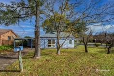  20 Oak Tree Drive Armidale NSW 2350 $400,000 - $440,000 Positioned on a peaceful corner block in a quiet street, 20 Oak Tree Drive presents an exciting opportunity for first-home buyers seeking space, comfort, and future potential. Just minutes from the heart of town, this well-located property combines convenience with a warm, homely feel. Inside, you’ll find two generously sized bedrooms, both featuring built-in wardrobes. The open-plan living and dining area is enhanced by stylish dark floor tiles and a cosy wood fireplace—perfect for relaxing or entertaining year-round. The U-shaped kitchen is designed with functionality in mind, offering ample storage and a walk-in pantry for added convenience. Two bathrooms add to the practicality of the home, while plantation shutters throughout offer a tasteful finishing touch and allow for both privacy and natural light. Set on a generous 787m² block, the property also includes a single carport, shed, and an inviting undercover front porch—ideal for enjoying a morning coffee or evening breeze. Whether you’re looking to move straight in or personalise and add value over time, this is a fantastic entry-level opportunity in a sought-after location. 