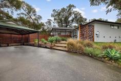  6 Jindalee Court Frankston VIC 3199 $760,000 - $836,000 Renovated 3-Bedroom family home nestled at the end of a tranquil cul-de-sac in the sought-after Marylands Estate, this beautiful 3-bedroom, 2-bathroom home offers a harmonious blend of rustic charm and contemporary elegance. Set on a generous 677m² block, the property provides a serene retreat with modern comforts. Key Features: Spacious living areas: The light-filled living room features an open fireplace, built-in shelving, and bi-fold doors that open to a rear deck, creating a seamless indoor-outdoor flow. Modern kitchen: The stylish kitchen boasts stainless-steel appliances, including a Smeg induction cooktop, and a convenient servery window to the rear deck, ideal for entertaining. Master Suite: The master bedroom offers access to a brand new ensuite and walk in robe, combining convenience and privacy. Climate Control: Enjoy year-round comfort with split-system air-conditioning and gas ducted heating. Outdoor Living: A front porch overlooks treetop views, while the secure rear yard features a vegetable garden and storage shed. Parking: The property includes a double carport for secure off-street parking. Lifestyle & Location: Situated moments from award-winning Frankston Beach, Ballam Park, Karingal Hub, schools, and public transport, this home offers an enviable lifestyle. The elevated position at the end of a quiet court ensures peace and privacy, while the proximity to Peninsula Link provides easy access to the broader Mornington Peninsula 