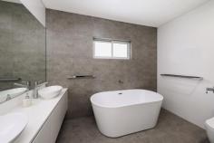  357 Marion Street Georges Hall NSW 2198 $1,599,950 Offering an impressive blend of size, comfort and quality finishes, this near-new duplex is a rare find set on over 400m2 with a flexible layout ideal for modern family living. Boasting five generous bedrooms, all with built-in wardrobes, plus a separate home office, this residence provides space for everyone. The master suite features a walk-in wardrobe, ensuite, ceiling fan and a private balcony with sweeping district views toward the Sutherland Shire. Living zones are thoughtfully spread across both levels. The open-plan kitchen, living and dining area flows effortlessly to the outdoor alfresco, while the upstairs living space is perfect as a kids' retreat or additional lounge. The kitchen impresses with 40mm stone benchtops, gas cooking and quality appliances. There are modern bathrooms on both levels, plus a separate laundry with an extra toilet and direct access to the yard. Outdoors, entertain in style under the covered alfresco with a built-in gas BBQ, burner and sink, overlooking the spacious backyard. Additional features include: Ducted air conditioning and ducted vacuum Security alarm and video intercom Combination of double brick and brick veneer construction Single lock-up garage plus separate driveway with off-street parking A premium opportunity offering space, flexibility and a rare land size - all in a quiet, family-friendly setting. 