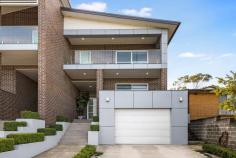  357 Marion Street Georges Hall NSW 2198 $1,599,950 Offering an impressive blend of size, comfort and quality finishes, this near-new duplex is a rare find set on over 400m2 with a flexible layout ideal for modern family living. Boasting five generous bedrooms, all with built-in wardrobes, plus a separate home office, this residence provides space for everyone. The master suite features a walk-in wardrobe, ensuite, ceiling fan and a private balcony with sweeping district views toward the Sutherland Shire. Living zones are thoughtfully spread across both levels. The open-plan kitchen, living and dining area flows effortlessly to the outdoor alfresco, while the upstairs living space is perfect as a kids' retreat or additional lounge. The kitchen impresses with 40mm stone benchtops, gas cooking and quality appliances. There are modern bathrooms on both levels, plus a separate laundry with an extra toilet and direct access to the yard. Outdoors, entertain in style under the covered alfresco with a built-in gas BBQ, burner and sink, overlooking the spacious backyard. Additional features include: Ducted air conditioning and ducted vacuum Security alarm and video intercom Combination of double brick and brick veneer construction Single lock-up garage plus separate driveway with off-street parking A premium opportunity offering space, flexibility and a rare land size - all in a quiet, family-friendly setting. 