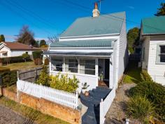  57 Govetts Leap Road Blackheath NSW 2785 $900,000 - $990,000 'Holly Cottage' circa 1900 is an elegantly renovated turn of the century property with fireplaces in every room and gracious proportions. A warm and welcoming interior has been sympathetically curated in line with this home's retained period features: 12ft high ceilings, NZ Kauri Pine floors and timber lined walls ensure that this home tugs at your heart strings from the moment of entry. A sunroom bathed in natural light offers a tranquil reading spot, the bedrooms have a heartwarming ambience and the central living room, with its powerful slow combustion real wood fire, says "Ahhh , at last, I'm home". Every metre of this property has been used to its best advantage and seeing is believing. From the kitchen, dining area there is access to a spacious mudroom and full bathroom with internal laundry. A level garden grants rear access and off street parking for two vehicles if desired. Here is where you will also find a stylish mini mobile home that is ideal for visiting guests who can enjoy their own slice of mountain privacy. If you play your cards right, this could very well be the turn-key residence that you did not even know you were looking for. Those with a keen interest should add this one to their priority viewing list without delay. Breakdown of Features: Mountain cottage less than a 300 metre stroll from village cafes, shops and amenities Stylishly curated interiors with 12ft high ceilings; timber lined walls and NZ Kauri pine floors Two queen bedrooms with original fireplaces & seating areas; ducted gas wall heater in 2nd Central living room with slow combustion real wood fire; internal hallway doors Light-filled galley-style kitchen with gas cooking and dining area with skylight Spacious mud room to rear and bathroom with internal laundry and storage; instant hot water Level garden with rear access and off-street parking for two vehicles Mini-mobile home with private seating area perfect for visiting friends and family 