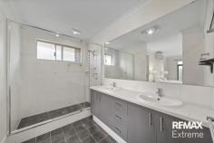  71 Spring Hill Tapping WA 6065 Tapping’s most trusted agents are proud to present this stunning 4-bedroom, 2-bathroom, residence that also boasts study (5th bed / nursery), activity & home theatre for your viewing pleasure. Features & benefits include: * Timeless & elegant street appeal * Landscaped front gardens * Front verandah * Entrance hall * Master bedroom with twin walk-in robes, ceiling fan, reverse cycle split system air conditioning & ensuite with large shower, twin vanity & separate WC * Home theatre with ceiling fan & reverse cycle, split system air conditioning * Separate study/home office with reverse cycle, split system air conditioning * Spacious, open plan family & meals areas with ceiling fans & reverse cycle, split system air conditioning * Kitchen with double fridge/freezer recess, breakfast bar, stainless steel appliances including dishwasher & 900mm cooktop, large walk-in pantry & shoppers’ access from the garage * 3 further spacious bedrooms with mirrored, sliding door robes — one with ceiling fan & reverse cycle, split system air conditioning * Family bathroom with shower, bath & vanity * Activity area * Well appointed laundry with large walk in linen/storage closet * Powder room * Alfresco * Grass area * Easy care gardens * Double, remote garage with store area & roller door through access * Plenty of parking for guests or toys with extensive block paving * Large 554sqm block * Situated across from Spring Park nature trails, within walking distance of schools (Spring Hill Primary just down the street), parks & transport * Close to local shops & amenities 