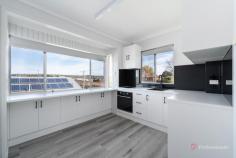  6/57 Faulkner Street Armidale NSW 2350 $385,000 - $420,000 Positioned in a well-maintained complex of just six units, 6/57 Faulkner Street presents an exceptional opportunity for those seeking a stylish, centrally located Armidale residence. Recently renovated throughout, this neat two-bedroom unit offers contemporary comfort with thoughtful upgrades and light-filled interiors. Both bedrooms include built-in wardrobes and enjoy natural sunlight, while the carpeted living room provides a cosy space with gas heating for year-round comfort. The freshly updated kitchen is a standout feature, boasting new appliances, sleek black finishes, abundant storage, and picturesque views over town. The bathroom includes a shower over half bath, vanity, and integrated laundry space, complemented by a separate toilet for added convenience. Complete with modern blinds throughout, a single carport, and elevated outlooks from every room, this property is ideal for investors or tenants seeking convenience, style, and ease. 