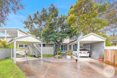 79 Rigney Street Shoal Bay NSW 2315 $1,000,000 Perfectly positioned in one of Port Stephens' most sought-after coastal suburbs, this two-storey property presents a rare opportunity for investors, extended families, or those seeking an additional income stream. Surrounded by some of the region's most iconic beaches - Shoal Bay Beach for calm swimming, Box Beach for excellent surf, and the beautiful Zenith Beach - this home embraces lifestyle, location, and flexibility. Cleverly designed for multi-generational living or rental potential, the home comprises two fully self-contained homes, one on each level. Each level offers three generous bedrooms, a full kitchen, bathroom, and an open-plan living area. Upstairs features a balcony with a beautiful leafy outlook, while the downstairs level opens to its own private yard. Both units enjoy separate access, their own separate outdoor spaces, and individual carports, ensuring privacy and convenience for occupants. Whether you're looking to live in one and rent out the other, accommodate family members while maintaining independence, or add a dual-income property to your investment portfolio, this home offers unmatched versatility in a premium coastal setting. Don't miss this incredible opportunity to secure a unique property in Shoal Bay, just minutes from pristine beaches, local cafés, and scenic walking tracks.  