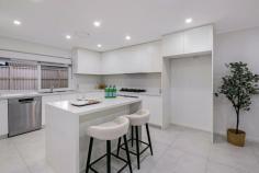  18 Handle Street Bass Hill NSW 2197 Welcome to this beautifully renovated family home, perfectly positioned just steps from Bass Hill Plaza. Offering an exceptional blend of modern finishes, spacious interiors, and versatile living, this residence is ideal for growing families seeking comfort and convenience in a prime location. Key Features: Five generous bedrooms, master with walk-in robe and ensuite Sleek modern kitchen with gas cooking, stone benchtops, and island breakfast bar Multiple light-filled living areas ideal for entertaining and family gatherings Stylish bathrooms with quality fixtures and fittings throughout Ducted air conditioning and downlights for year-round comfort Expansive undercover alfresco area, perfect for outdoor dining and entertaining Fully fenced, low-maintenance yard with landscaped gardens Versatile studio/home office at the rear with its own bathroom Secure carport with ample driveway parking Positioned on approx. 581.7m² with an approx. 19m wide frontage in a quiet street Only 200m walk to Bass Hill Plaza, moments to schools, parks, and transport This home truly offers the ultimate lifestyle opportunity with nothing more to spend. Simply move in and enjoy the space, style, and unbeatable location. 
