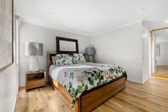  7 Callantina Court Frankston VIC 3199 $930,000 - $1,020,000 Exquisitely renovated, yet never too far from its inspired architectural origins, this 4-bedroom, 2-lounge family home showcases a timeless design with a bold modern twist, relishing a peaceful bowl-of-court setting the growing family will surely love. Crafted for comfort and connection across a well-zoned allotment, every inch has been reimagined to keep pace with real family living without sacrificing any style. It's all polish and presence from the street with its enhanced facade, stepping inside to fresh timber-look floors, a wood flue heater and cathedral ceilings over its split-level lounge and formal dining room. A wall of north-facing windows illuminates the captivating kitchen in unison with LED feature lighting, adorning the quality appliances and wood-look counters of its island-style entertainer's design. The rear family and dining space slides outdoors to a covered terrace that's party-ready, stretching out to a low-maintenance yard and separate firepit zone with space for the kids, and still plenty left over for a trampoline or pool (STCA). The master's walk-through robe and show-stopping ensuite match classic with contemporary, while the main bathroom mirrors the same high-end finish for the remaining three bedrooms that surround. Comfort is locked in with ducted heating, split-system air conditioning, LED lighting, solar power, a storage shed and a double garage, with its position set in one of the area's most liveable pockets, metres from Kingsley Park Primary, and just moments from Shaxton Reserve, buzzing cafés, buses, natural walking trails, and easy access to Frankston CBD, Karingal Hub, and the Mornington Peninsula. 