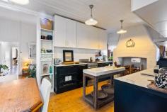  57 Govetts Leap Road Blackheath NSW 2785 $900,000 - $990,000 'Holly Cottage' circa 1900 is an elegantly renovated turn of the century property with fireplaces in every room and gracious proportions. A warm and welcoming interior has been sympathetically curated in line with this home's retained period features: 12ft high ceilings, NZ Kauri Pine floors and timber lined walls ensure that this home tugs at your heart strings from the moment of entry. A sunroom bathed in natural light offers a tranquil reading spot, the bedrooms have a heartwarming ambience and the central living room, with its powerful slow combustion real wood fire, says "Ahhh , at last, I'm home". Every metre of this property has been used to its best advantage and seeing is believing. From the kitchen, dining area there is access to a spacious mudroom and full bathroom with internal laundry. A level garden grants rear access and off street parking for two vehicles if desired. Here is where you will also find a stylish mini mobile home that is ideal for visiting guests who can enjoy their own slice of mountain privacy. If you play your cards right, this could very well be the turn-key residence that you did not even know you were looking for. Those with a keen interest should add this one to their priority viewing list without delay. Breakdown of Features: Mountain cottage less than a 300 metre stroll from village cafes, shops and amenities Stylishly curated interiors with 12ft high ceilings; timber lined walls and NZ Kauri pine floors Two queen bedrooms with original fireplaces & seating areas; ducted gas wall heater in 2nd Central living room with slow combustion real wood fire; internal hallway doors Light-filled galley-style kitchen with gas cooking and dining area with skylight Spacious mud room to rear and bathroom with internal laundry and storage; instant hot water Level garden with rear access and off-street parking for two vehicles Mini-mobile home with private seating area perfect for visiting friends and family 