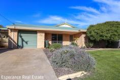  50 Easton Road Castletown WA 6450 This spacious 4 bedroom, 2 bathroom home offers comfort and functionality for the whole family. Enjoy multiple living zones including a sunken formal lounge, open plan kitchen, dining and family areas and a large fully enclosed entertaining space that flows seamlessly to the Gable roof, outdoor patio and secondary alfresco area. Features include a cosy tile fire, ceiling fans to master bedroom and family zone, walk-in and built-in robes to 3 of the 4 bedrooms. Rear yard access to the workshop and garage – perfect for the home handyman or extra storage. School and shopping not too far away. 
