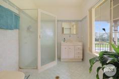  126-134 Bylong Road Tamworth NSW 2340 $1,300,000 - $1,400,000 If you've been searching for a home that blends timeless charm with room for the whole family, this spacious property ticks all the boxes. From the moment you step inside, you're greeted with high ceilings throughout, and a formal lounge adorned with stylish cornices and decorative ceiling rosettes, offering a warm and elegant welcome. Privately set to one end of the home are four generous bedrooms, each with built-in robes, serviced by a spacious main bathroom with a separate toilet for added convenience. The master bedroom is located separately and offers great privacy, complete with its own ensuite and built in robe. The heart of the home is the charming emerald green kitchen, boasting a walk-in pantry and views over the open-plan living and dining area - perfect for everyday living and entertaining. A real standout is the sunken games room, bathed in natural light from large windows, offering a versatile space for relaxing or hosting guests. A full-size snooker table currently takes pride of place it is not included in the sale however can be negotiated as part of the sale if desired. Functionality continues with a well-appointed laundry that opens directly to the pool area and includes two double storage cupboards. Outside, the property truly shines with infrastructure to suit the hobbyist or tradesperson: A three bay shed with an adjoining men's workshop An additional two-bay carport extension A separate shed designed to house a caravan, float, or trailer The property is fitted with a 7.7kw solar system with 18 panels, its own private bore servicing the taps in the house yard taps along with this there is also 2 x 5,000ltr concrete tanks and a 7,000ltr poly tank. This is a home that offers lifestyle, space, and style in a peaceful setting all whilst being in town - a rare opportunity in the Tamworth market. 