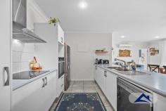  10 Tyenna Close BENTLEY PARK QLD 4869 $699,000 Welcome to 10 Tyenna Close, a home to fall in love with the moment you step inside. Set in lovely, quiet street in Silkwood Ridge Estate, this property presents like brand new and will not last long on the market. Best be quick to inspect. Features: * Well-designed layout with two separate, light filled living areas providing lots of space for the whole family. * Master bedroom with walk-in wardrobe and stylish ensuite, privately situated away from the other bedrooms. * Well-appointed kitchen featuring built-in wall oven, ceramic cooktop and rangehood, large fridge recess and dishwasher. The family chef will love this. * Tiled back patio overlooks the lush, flat backyard that offers plenty of secure space for the kids and pets to play. * Main bathroom with separate shower and bath. Great for young kids. * 10 KW Solar Power System to keep the bills low. * Contemporary fixtures, fittings and flooring throughout. * Double lock-up garage with extra storage space in the attic accessible via fold-out ladder. * Terrific street with great neighbours and mountain views. * Rental Appraisal of $710 per week. This gorgeous property is simply picture perfect and will be a happy home for you for years to come. 