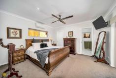  5 Senate Street Bentley Park QLD 4869 $889,000 Whether you're seeking space, serenity, or the perfect family lifestyle, this unique offering delivers it all. Set high in sought-after Upper Bentley Park, this beautifully elevated family home is a dream lifestyle opportunity you won't want to miss. Commanding panoramic mountain views and bathed in cooling summer breezes, this spacious home delivers a five-star lifestyle of refined comfort and seamless entertaining and everyday comfort. From the moment you arrive, the impeccable street presence, established tropical gardens, and resort-inspired sparkling saltwater pool set the tone for what lies beyond on the expansive 937m² allotment. Step inside to discover a light-filled, expansive open-plan design where multiple living zones flow seamlessly to a central alfresco space - perfect for relaxed family meals or entertaining guest's poolside. The recently renovated, large gourmet kitchen is the heart of the home and a chef's dream, boasting stainless steel appliances, Italian tiles and an abundant of storage, and a statement island bench ensuring comfort and practicality. The adjoining air-conditioned dining opens fully to the covered, private patio, crafting an idyllic indoor-outdoor experience that captures the essence of tropical Far North Queensland living. The massive second living area offers a serene retreat with stunning poolside views, perfect for relaxed lounging or effortless family entertaining. All four bedrooms are air-conditioned, generously sized, and thoughtfully positioned. The main suite enjoys private access to the alfresco, a walk-in robe, and a well-appointed en-suite - your own peaceful retreat. Both the renovated en-suite and main bathroom showcase modern finishes and thoughtful design, offering a luxurious touch to everyday living. Features You'll Love: Elevated 937m² block with commanding views and privacy Resort-style saltwater pool surrounded by lush greenery Massive open-plan living spaces with separate lounge and entertainer's kitchen 13.2kW solar system Security cameras linked to phone & TV Extra-large double remote garage with internal access All new fans throughout and air conditioners Security screens Garden shed Fully painted in 2023 New top end vinyl flooring to living areas Perched high on the hill and commanding breathtaking, uninterrupted views that will never be built out, this exceptional residence will be the envy of all. This residence is more than just a home, it is a private sanctuary offering space, style, and serenity in equal measure. Ideally located close to schools, day care centres, shops, and sporting facilities - and just 20 minutes from the heart of Cairns - this is the ultimate lifestyle address. 