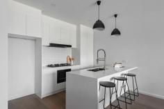  69B Yuille Street Frankston VIC 3199 $800,000 - $880,000 Welcome to 69B Yuille Street - a brand-new townhouse that perfectly balances luxury, functionality and low-maintenance living in one of Frankston's most convenient and fast-growing locations. Designed with quality and comfort in mind, this thoughtfully crafted home features three generous bedrooms, including a master suite with walk-in robe and private ensuite. The light-filled open plan living and dining area seamlessly connects to a private courtyard, creating the ideal setting for relaxed everyday living and effortless entertaining. At the heart of the home is a sleek designer kitchen with stone benchtops, premium appliances and excellent storage. The bathrooms are beautifully appointed with modern fixtures and floor-to-ceiling tiles, while additional features include a full laundry, ducted heating, split system cooling and a remote single garage. Ideally located just minutes from Frankston's vibrant CBD, the beach, Monash University, public transport and excellent local schools, this stunning residence offers the perfect opportunity for first home buyers, downsizers or investors alike. 