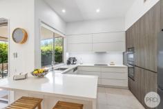  1A Tallean Road Nelson Bay NSW 2315 Built in 2022, this stunning near-new home presents an exceptional opportunity for those seeking a blend of modern luxury and location in the heart of Nelson Bay. In a convenient position, the home is an approx. 700m stroll from an array of shops, restaurants, and cafes. The home itself is crafted with quality materials, featuring a tasteful combination of brick and weatherboard that lends a timeless appeal. Privacy is thoughtfully considered, with the residence beautifully framed by a mature hedge and native plants, providing both natural greenery and an enhanced sense of seclusion whilst contributing to the established street presence. Step inside to discover an inviting open-plan layout where the living, kitchen, and dining areas flow seamlessly together. These spaces are flooded with natural light, enhanced by modern downlights, and complemented by ducted air conditioning. The kitchen is a true centrepiece of the home that caters perfectly to both everyday living and entertaining. From here, you can easily access the outdoor entertaining area, designed with minimal maintenance in mind and surrounded by lush greenery that ensures privacy for your relaxation and gatherings. The property accommodates three generously sized bedrooms, each thoughtfully designed to provide comfort and versatility. This makes the home ideally suited for retirees seeking a peaceful lifestyle, or anyone looking for the ultimate holiday retreat where tranquility meets convenience. Featuring: - Four bedrooms of accommodation plus study with carpeted flooring, ceiling fans and ducted air conditioning. The master suite has double sliding doors leading out onto a balcony - Open plan living, kitchen and dining space - Modern kitchen with quality appliances, including double oven, modern dishwasher and stainless steel sink - Outdoor covered entertaining area with minimal maintenance required - Electric awning on back deck - Luxaflex window blinds - 14 solar-hart panels providing energy efficiency - Oversized double lock up garage Location: - 450m stroll to bowling club - 650m stroll to golf club - 700m stroll to restaurants, cafes and specialty stores - 5 minute drive to Salamander Bay Shopping centre - 5 minute drive to Shoal Bay Beach With its contemporary features, prime location, and low-maintenance outdoor spaces, this residence promises a lifestyle of ease and luxury in one of Nelson Bay's most sought-after pockets. 