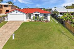  5A Sologinkin Rd Rural View QLD 4740 Perched in an elevated, tightly held pocket of Rural View, 5A Sologinkin Road offers more than just a generous landholding… It delivers a lifestyle defined by space, privacy and versatility. Set on a fully fenced 1,001m² block, with wide 3.5m side access, this property effortlessly blends everyday comfort with the kind of extras that make life feel a little more elevated. At the heart of the home, a streamlined kitchen connects effortlessly to open-plan living and dining. Designed for ease and function, the kitchen features a four burner electric cooktop, crisp white tile splashback, built in electric appliances and a recessed chopping board -small details that make everyday use a pleasure. There's also a generous open pantry and direct connection to the rear entertaining zone, making this layout feel fluid and considered. The main living area is climate controlled with a split system air conditioner, creating a central hub for relaxed family life or quiet evenings in. Accommodation is comfortably arranged with separation in mind. The master bedroom enjoys a separate position and features a full wall-length built-in robe, air conditioning and its own ensuite. Down a separate hallway, two additional bedrooms each include carpeted floors, built-in wardrobes and split-system air conditioning. These rooms are serviced by a spacious main bathroom with a bathtub, shower and built-in towel racks - a functional space finished with family in mind. A walk-in linen closet nearby adds valuable storage where it's needed most. Step outside and the home's entertaining credentials come to life. A full length epoxy coated alfresco area, covered by a modern flyover roofline, creates a breezy, low-maintenance space built for Mackay weather. From weekend barbecues to large family events, this is a setting that adapts to the moment. But the true game-changer is the shed. Spanning an impressive 9m x 9m, constructed with solid bessa block walls and offering 3.6m clearance through dual full-height sliding doors, this is an ideal setup for trades, hobbyists or anyone needing serious storage. There's also a concrete pad to the right, perfect for trailers, extra gear or future plans. Inside the shed, a separate air-conditioned room with a bathroom and living area offers huge potential. It's perfectly suited as a games room, teenage retreat, studio or the perfect home office. Visually, the home presents with clean white lines and a colourful roofline that stands confidently from the street. The elevated block brings natural breezes and a subtle sense of seclusion, all while keeping you just moments from schools, shopping centres and everyday essentials. 5A Sologinkin Road is more than a tidy family home. It's a complete lifestyle package with room to breathe and space to grow. Whether you're upsizing, seeking more functionality, or simply chasing that rare mix of comfort and capability, this property delivers in many ways. 