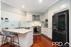  1B Bell Street Panania NSW 2213 Perfectly positioned in a peaceful and convenient location, this well-maintained 3-bedroom duplex offers a harmonious blend of comfort and convenience in the heart of Panania. Designed to capture abundant natural light with its desirable north-facing aspect, this home is perfect for families seeking space, functionality, and a vibrant community lifestyle. Key Features: - Spacious Living: 2 separate living areas provide ample space for relaxation and entertainment, catering to the needs of a growing family. - Sunlit Bedrooms: 3 generously sized bedrooms, each bathed in natural sunlight, offering comfortable retreats for all family members. - Gourmet Kitchen: A modern kitchen equipped with high-quality appliances and generous storage, perfect for culinary enthusiasts. - Gas Cooking: Enjoy the benefits of gas cooking and heating, enhancing energy efficiency and cooking precision. - Double Garage: Secure double garage with internal access, providing convenience and additional storage options. - Internal Laundry: Well-appointed internal laundry room, enhancing the home's functionality. - Solar Panel System: Reduce your carbon footprint and energy bills with the installed solar panel system. - Outdoor Entertaining: A covered entertaining area, ideal for hosting gatherings or enjoying quiet moments outdoors. Prime Location: - Approx 13-minute walk to Panania Train Station. - Just a 10-minute stroll to local shops, restaurants, and supermarkets. - Surrounded by schools, childcare centres and parks. This exceptional duplex combines modern living with a strategic location, making it a must-see for discerning buyers. Don't miss the opportunity to secure a home that offers both lifestyle and comfort. 