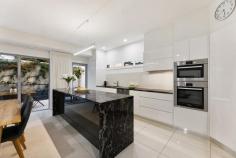  3/17 Amaroo Drive Buderim QLD 4556 Set in one of Buderim's most desirable streets, Unit 3 at 17 Amaroo Drive offers a rare mix of privacy, space, and low-maintenance living just a short, near-level walk to cafes, restaurants, and the village centre. Positioned in a boutique complex, this two-level townhouse stands out with the largest courtyard in the group, giving you generous outdoor space without the upkeep of a full-sized block. With a total of 206sqm, the layout is well thought out, offering practical living and entertaining options. Step inside to discover a stunning open-plan layout where bifold glass doors blur the line between indoor and outdoor spaces. The designer kitchen is the heart of the home, featuring two-pack cabinetry, natural stone benchtops, and premium appliances, including an induction cooktop-perfect for entertaining and everyday living. Upstairs, the king-size master suite offers a serene retreat with soaring ceilings and a luxurious marble-topped ensuite. A second bedroom and bathroom ensure comfort for guests or family, with an optional third bedroom or study available for those needing extra flexibility. Recent updates make the home more energy-efficient and future-proof, with solar power, solar hot water, and two large underground rainwater tanks that support household and garden use. Key Features: Prime Buderim location - walk to shops, cafés and amenities 206sqm over two levels with a generous courtyard Optional third bedroom or flexible-use space Modern kitchen with stone finishes and AEG appliances King-size master suite with marble ensuite 6.6kW solar power + solar hot water Two 20,000L underground rainwater tanks Secure, gated vehicle access Fully integrated climate control and LED lighting This home offers a rare balance of space, privacy, and convenience in a tightly held area of Buderim. Ideal for downsizers, professional couples, or anyone wanting a low-maintenance home without compromising on lifestyle. 